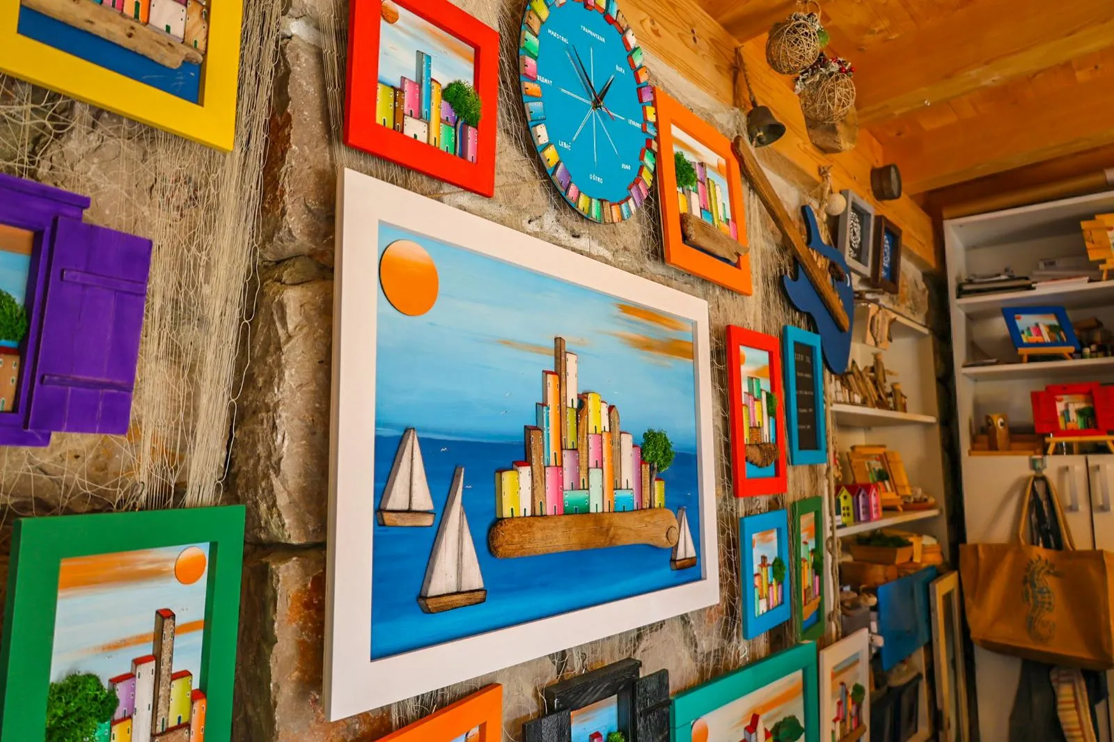 Driftwood paintings on the wall of the Drveni Val studio